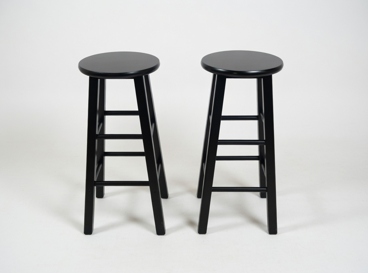 Black wooden stools available at The Town Hall